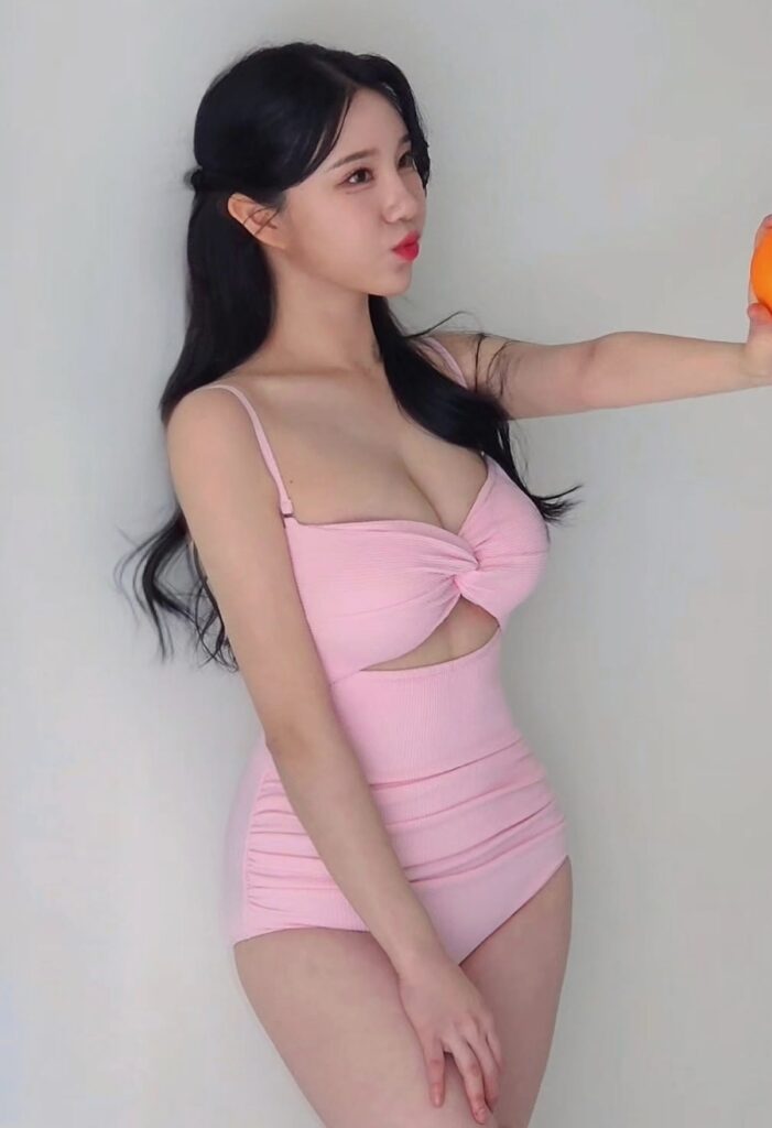 Kim Hyun-young leading crowd chants at a KBO game, long lines and high-energy choreography, 170 cm cheerleader and model.